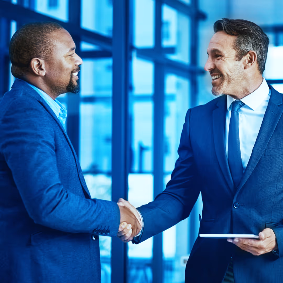Two business partners shaking hands