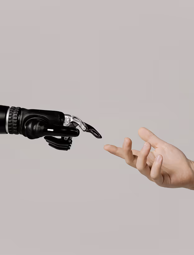 human hand reaching out to a robot