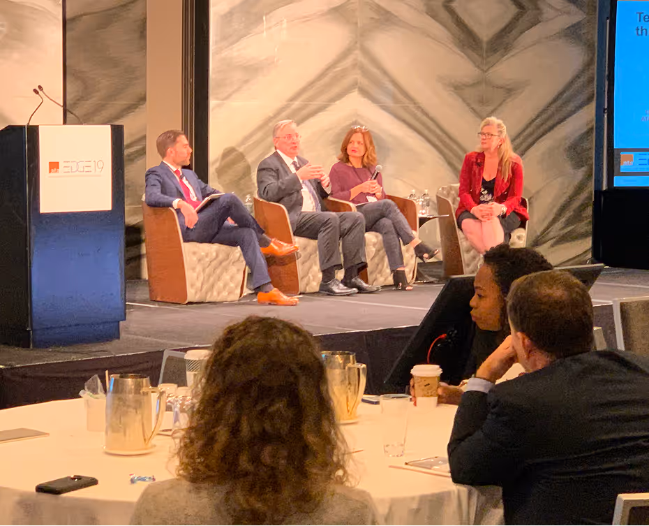Nancy chairing a panel discussion