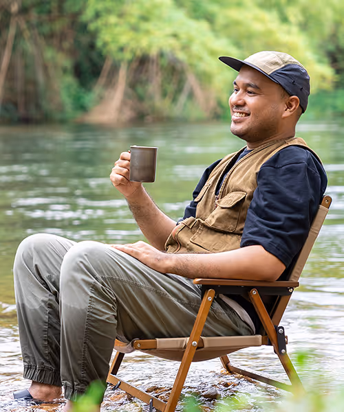 Man sitting in a stream