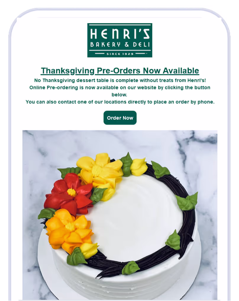 a white cake with flowers on it