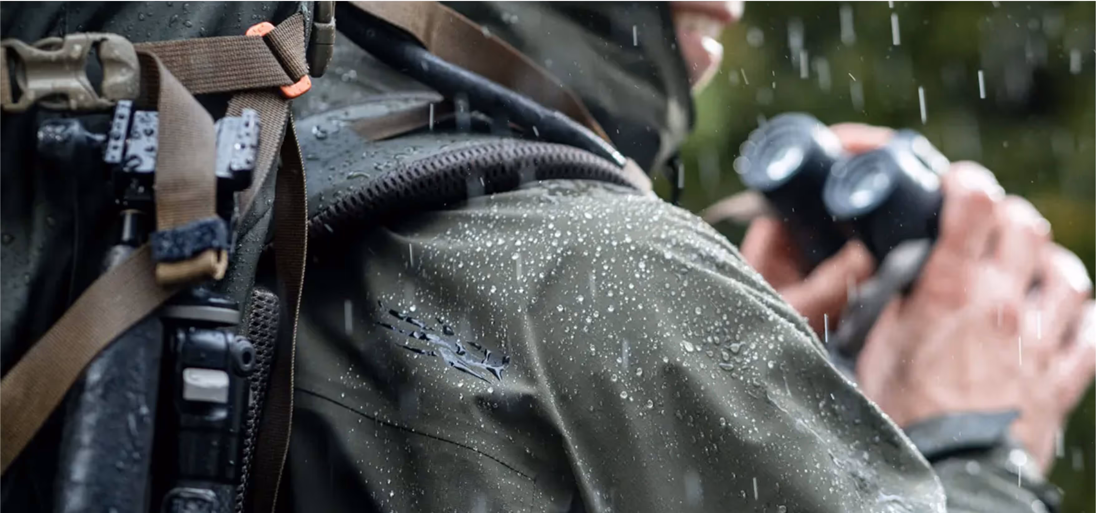 Sitka tactical gear being used in wet weather conditions