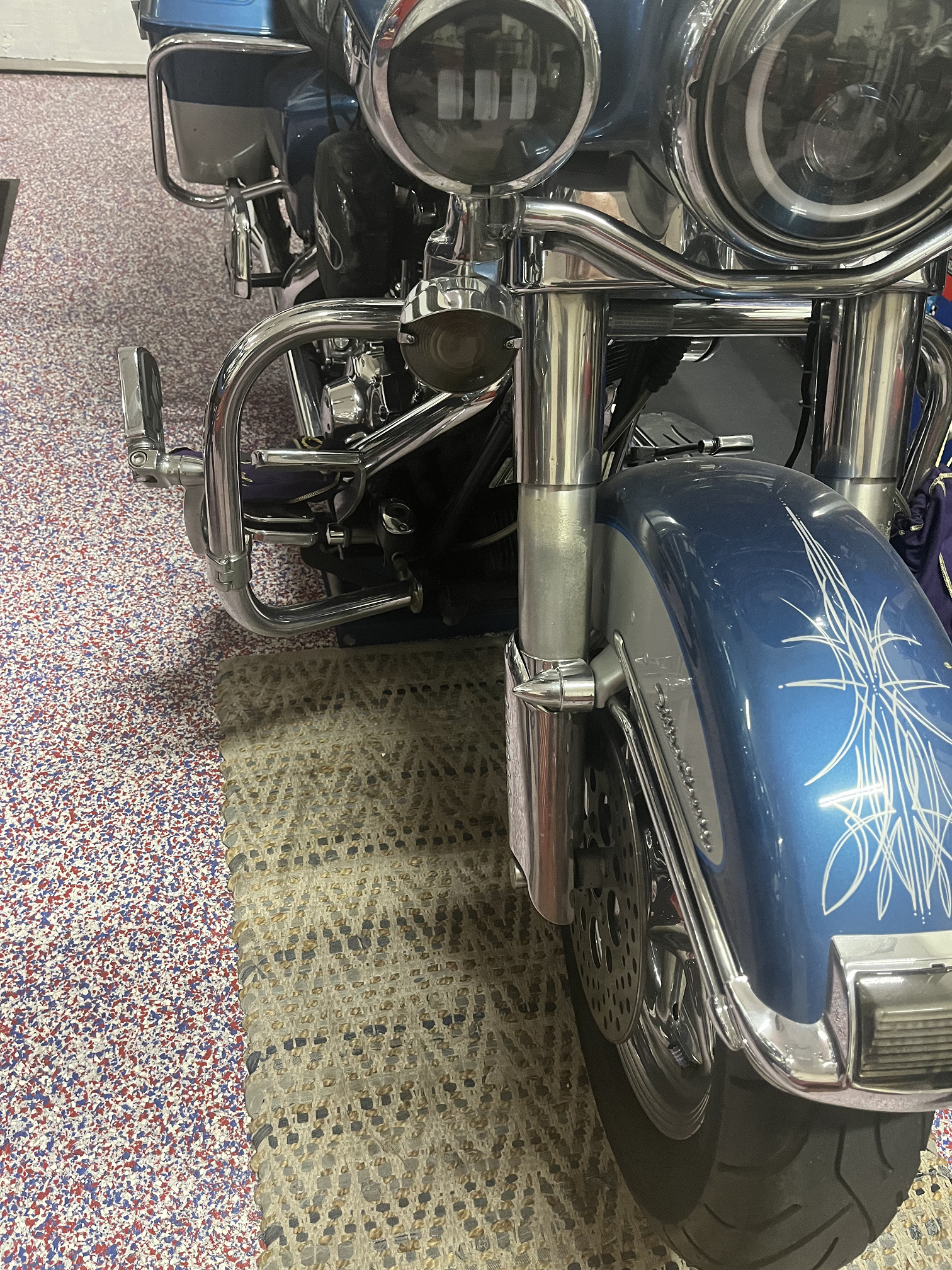 Close up of custom suspension components on a motorcycle