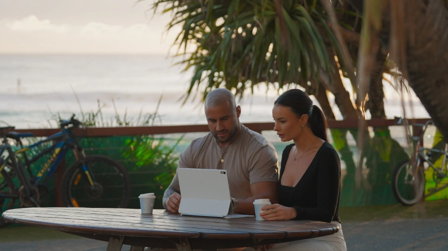 Co-founders Tadhg Stephens and Heather Duffy researching property options by the ocean for first-time buyers with Monarch Buyers Agents