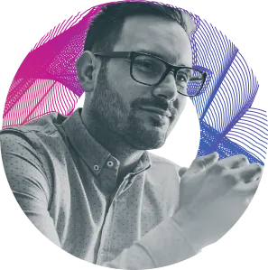 A man wearing glasses and a blue shirt. - Forme Images