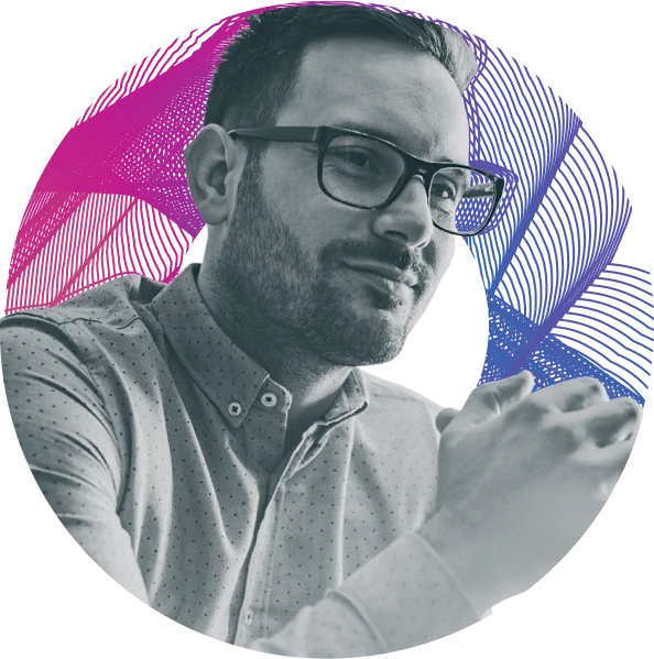 A man wearing glasses and a blue shirt. - Forme Images