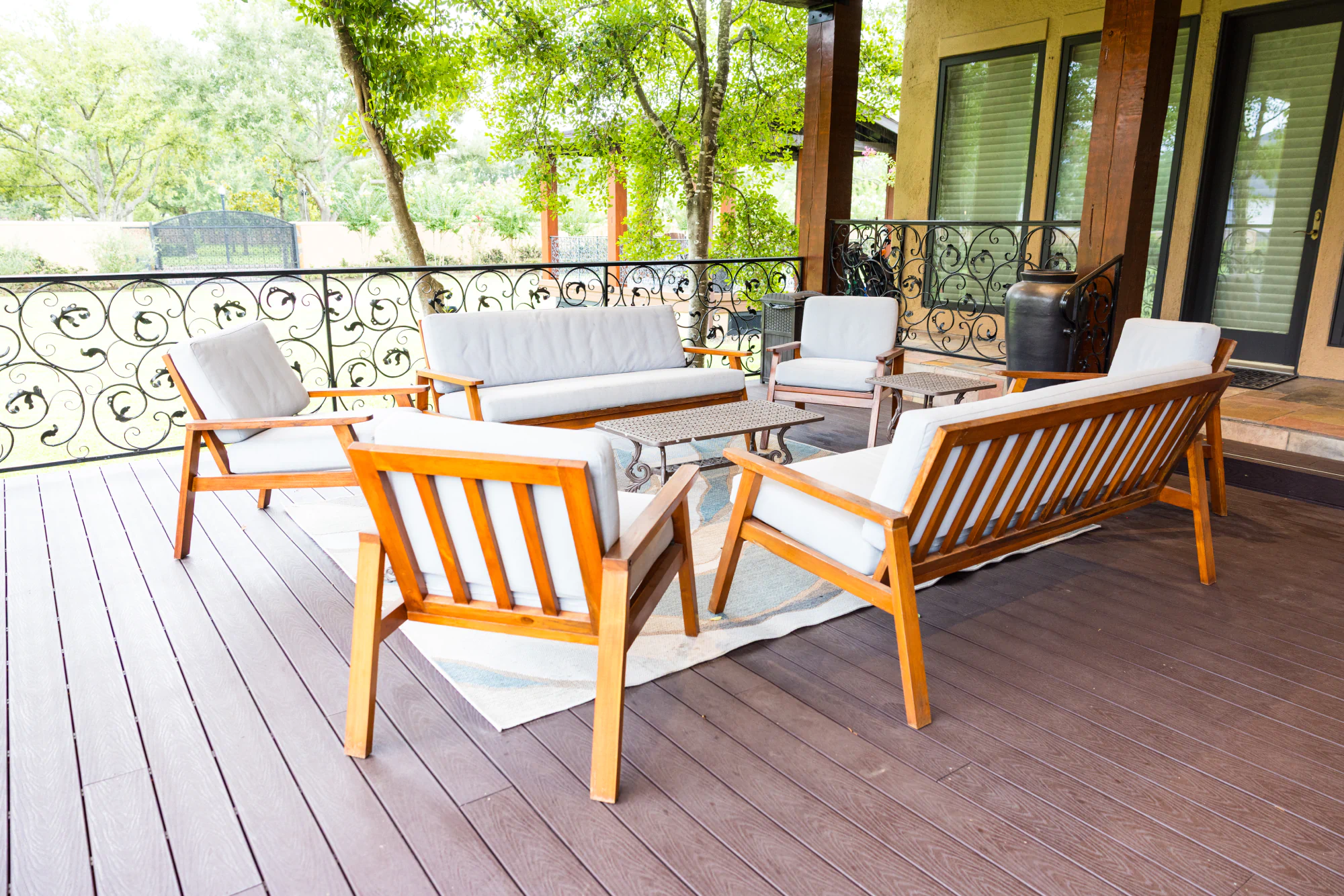 Living Designs Furniture teak wood patio furniture in a real Houston home