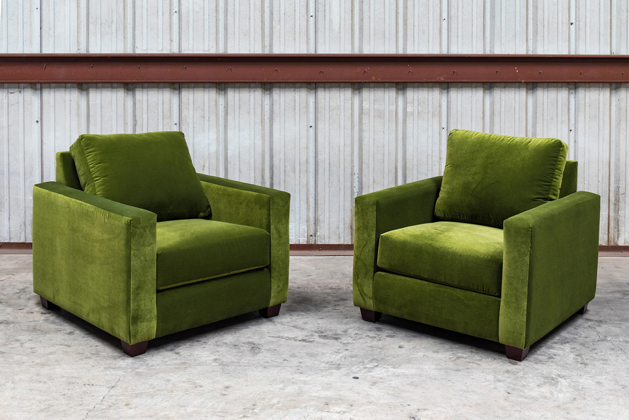 Olive velvet oversized arm chairs made by Living Designs Furniture