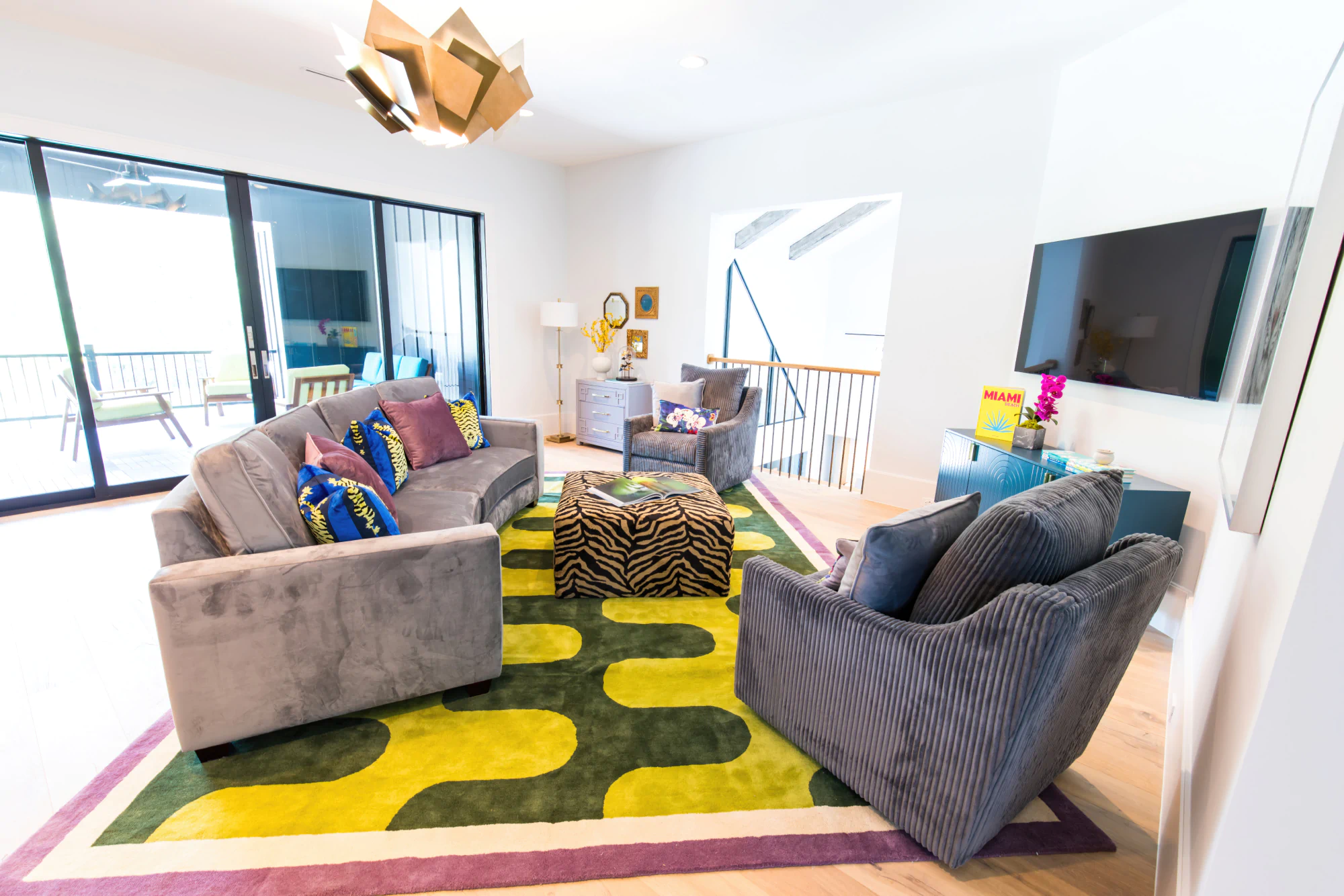 Colorful living room by Living Designs Furniture