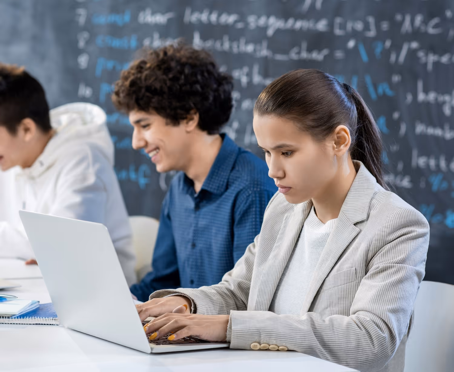 Students and teacher discussing privacy policy in class.