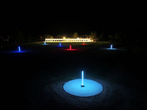 image of a professional cyclist being fitted in a bicycle shop's fitting area