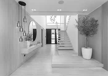 interior fit out of a villa's lobby featuring travertine stone and a grand staircase