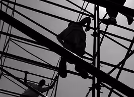 turnkey interior fit out of a bedroom in Al Barari, Dubai featuring walnut woods and custom furniture
