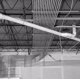 turnkey interior fit out of a bedroom in Al Barari, Dubai featuring walnut woods and custom furniture