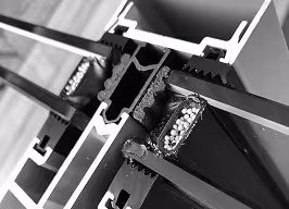 interior fit out of a villa's lobby featuring travertine stone and a grand staircase