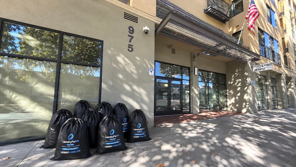 LaundryForMe bags outside a local building