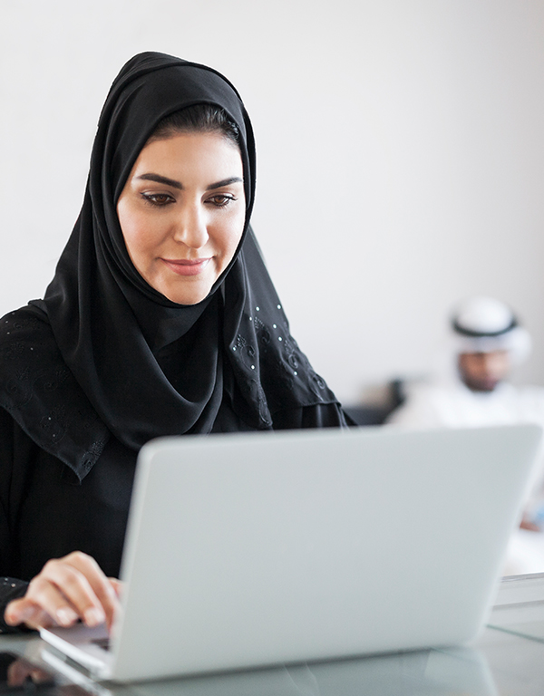 An Arab woman working in digital consultancy