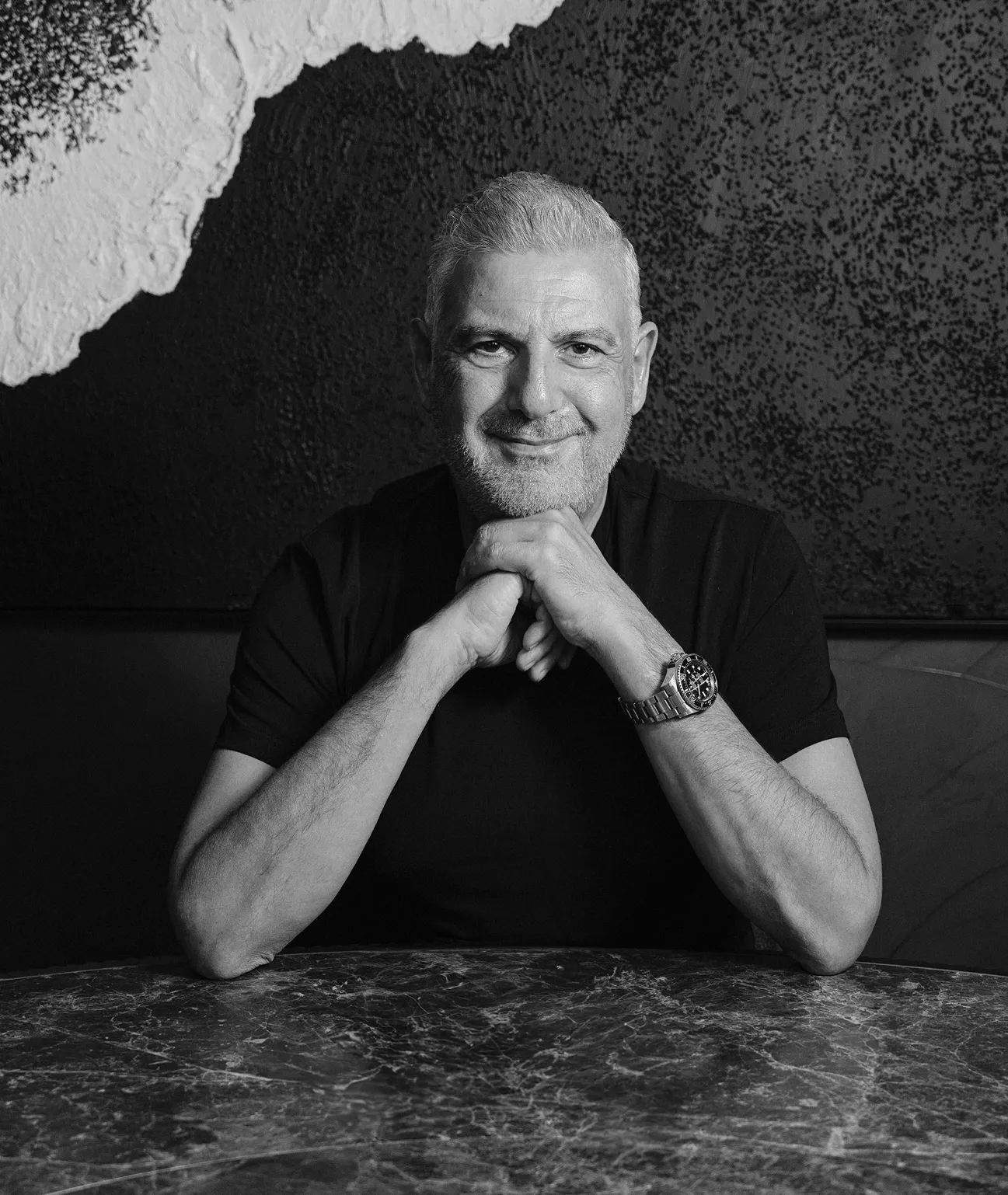 Steve George Makris, producer of The Seventh Seat, is at the table.