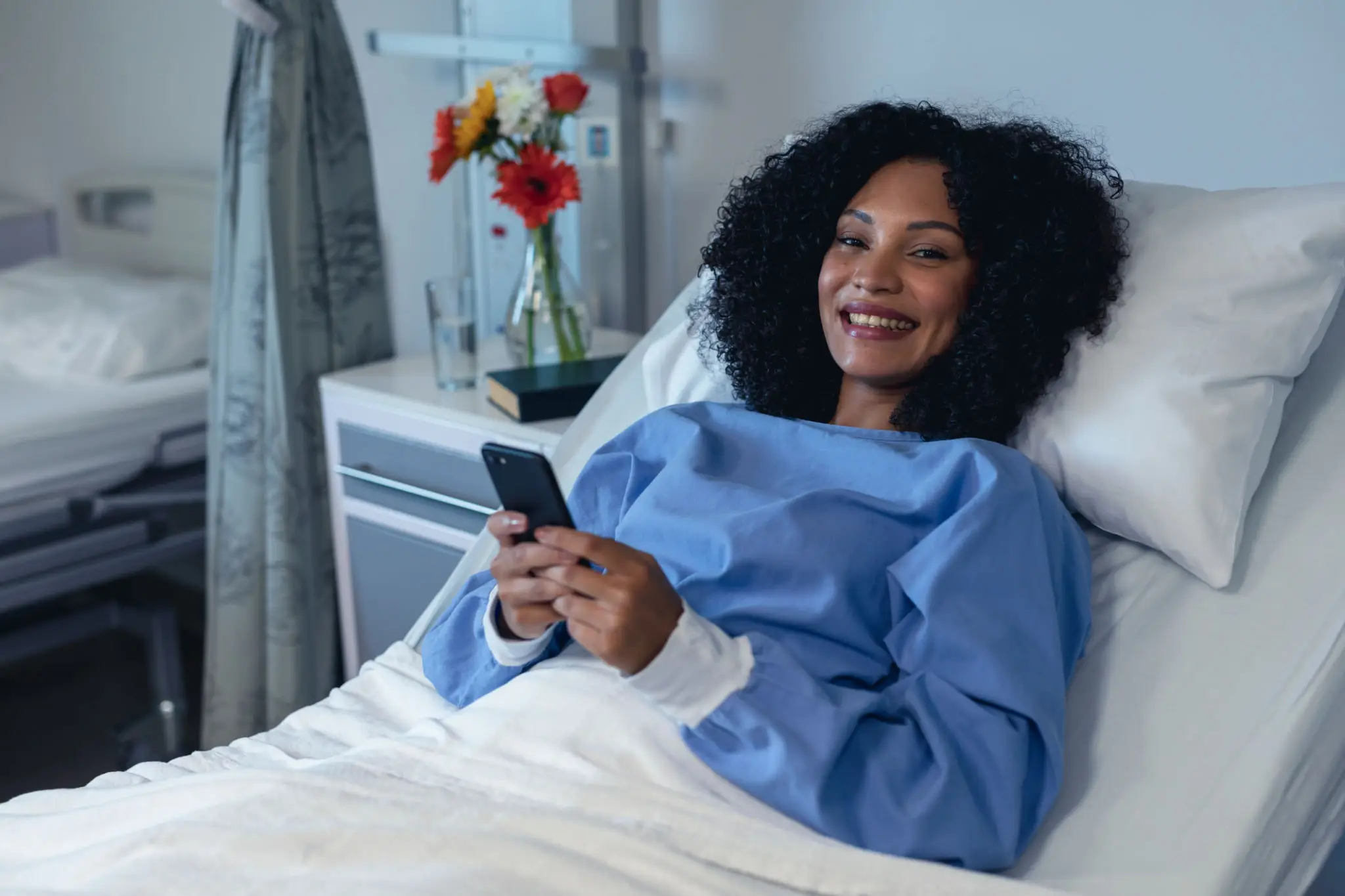 Smiling woman with phone