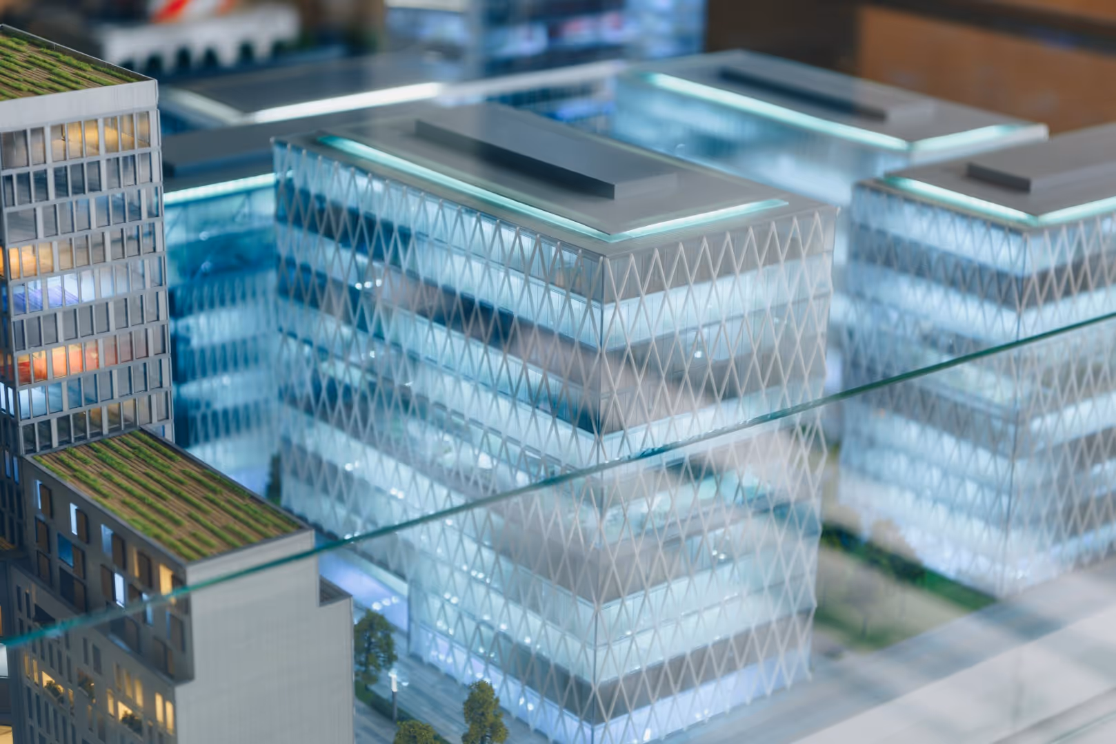 A model of a city with a glass case.