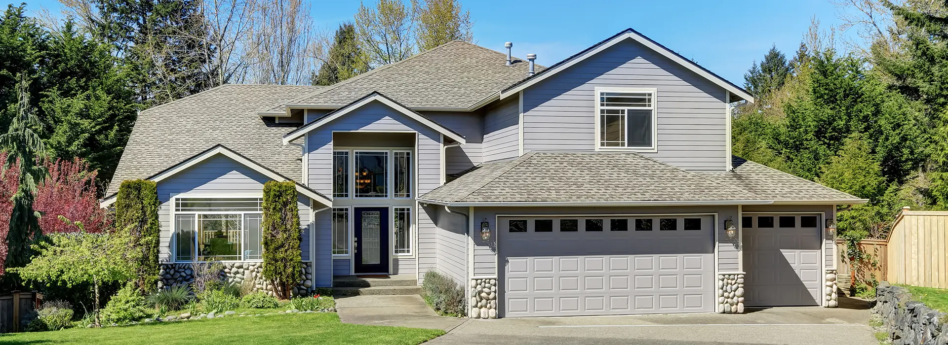 Exterior of a beautiful modern home with gray siding