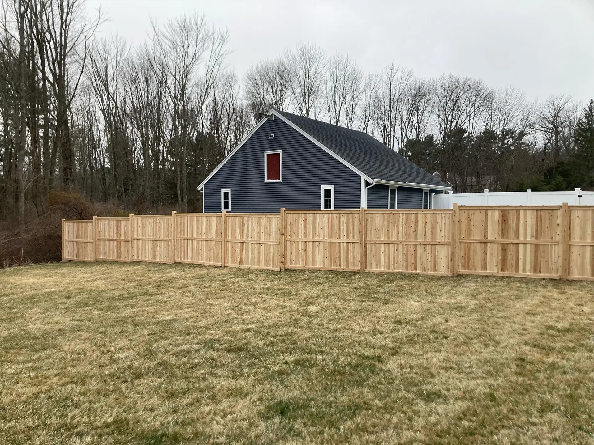 long wooden fence in yar