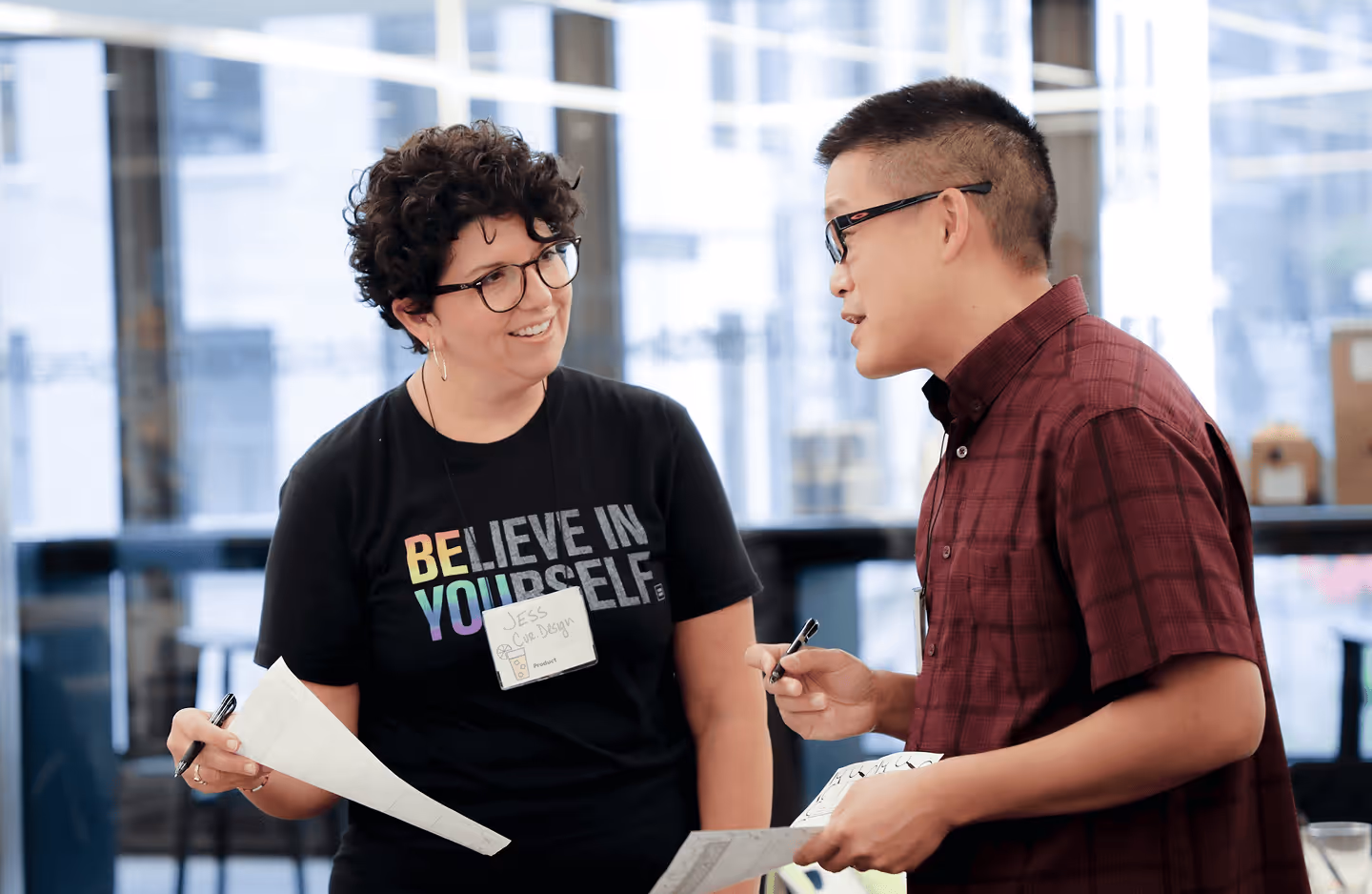 two inquired employees talking
