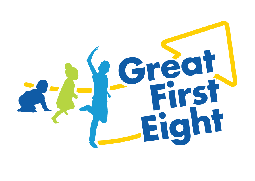 two young students sat close to each other and talking