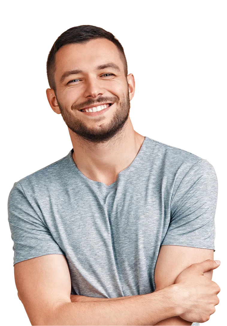 Smiling man in grey t-shirt with arms crossed