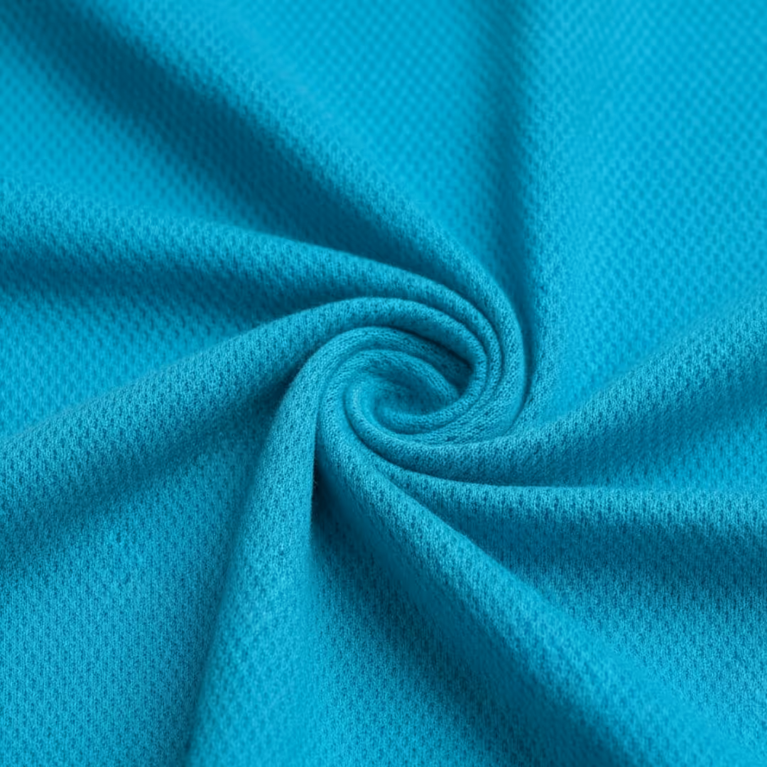 Close-up of turquoise blue textured fabric twisted in the center.