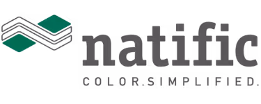 Three people in a laboratory setting, two wearing white lab coats and one holding a framed certificate.