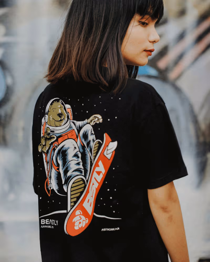 Close-up of a large yellow fabric roll on a production line in a textile factory.