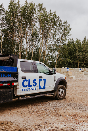 CLS Landscape delivery truck in a supply yard
