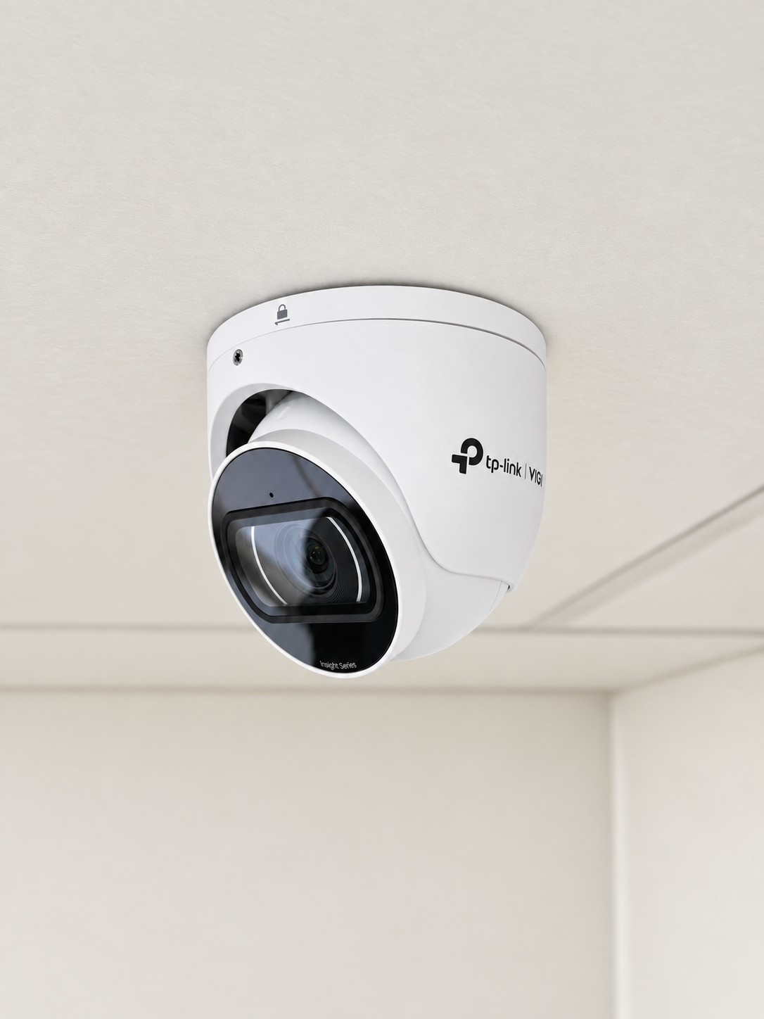 White security camera installed on a building exterior