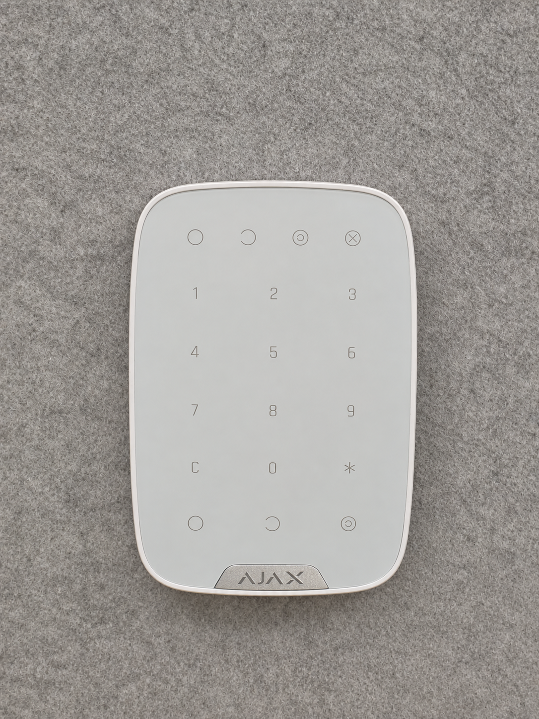 Ajax alarm keypad installed on an interior wall