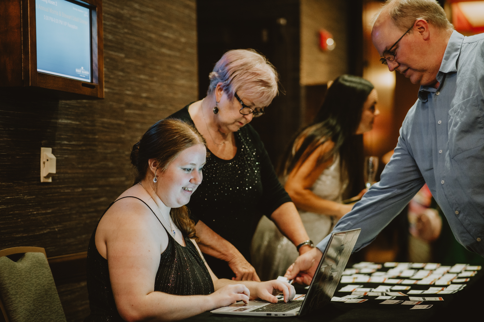 People checking in for a gala