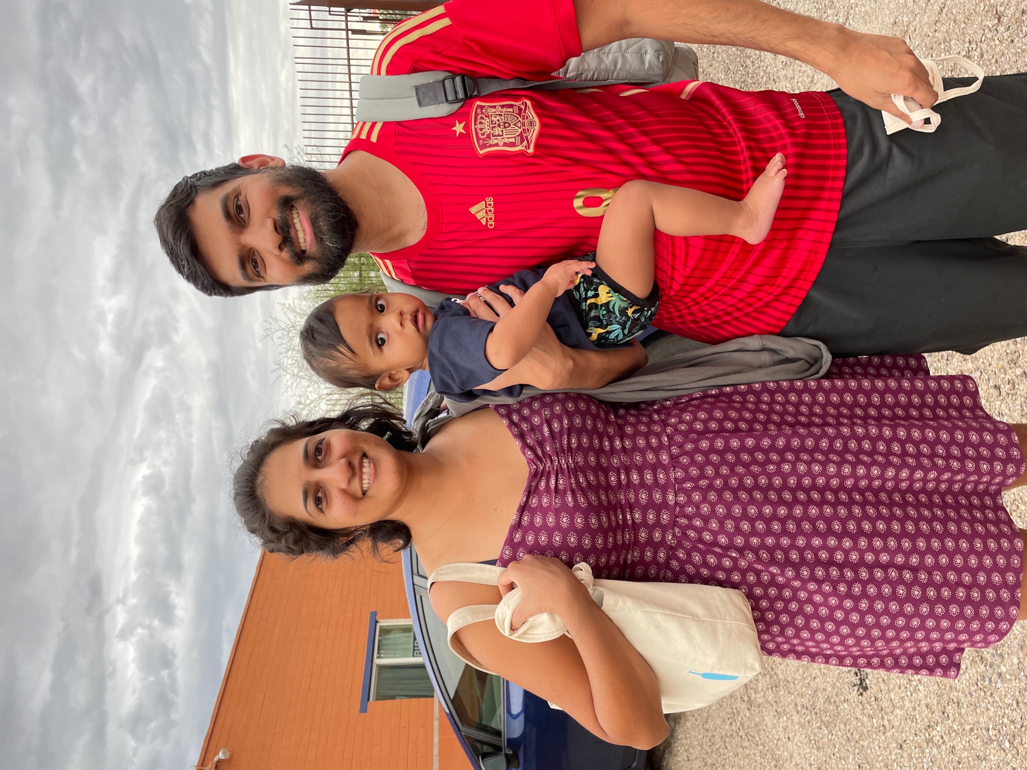 A young family volunteers