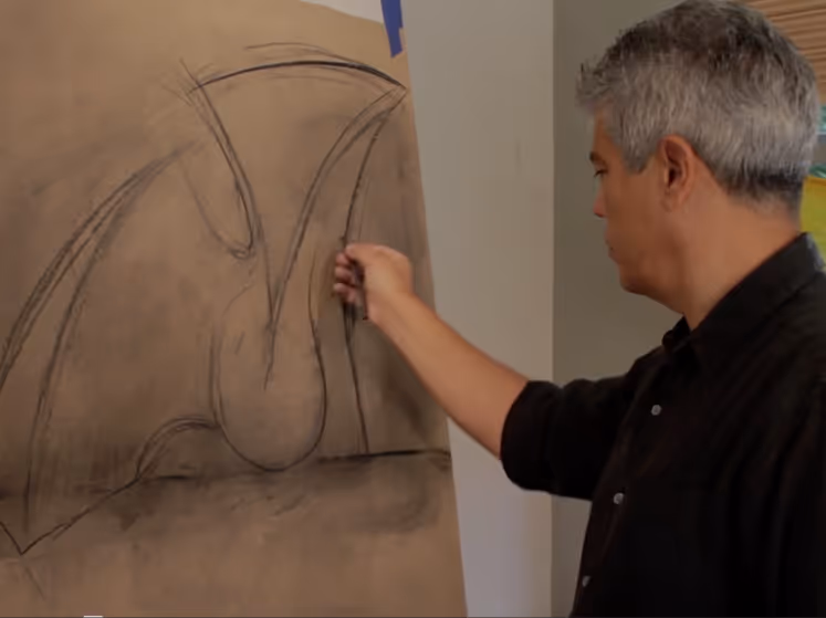 Latchezar drawing sculpture concept on large brown board