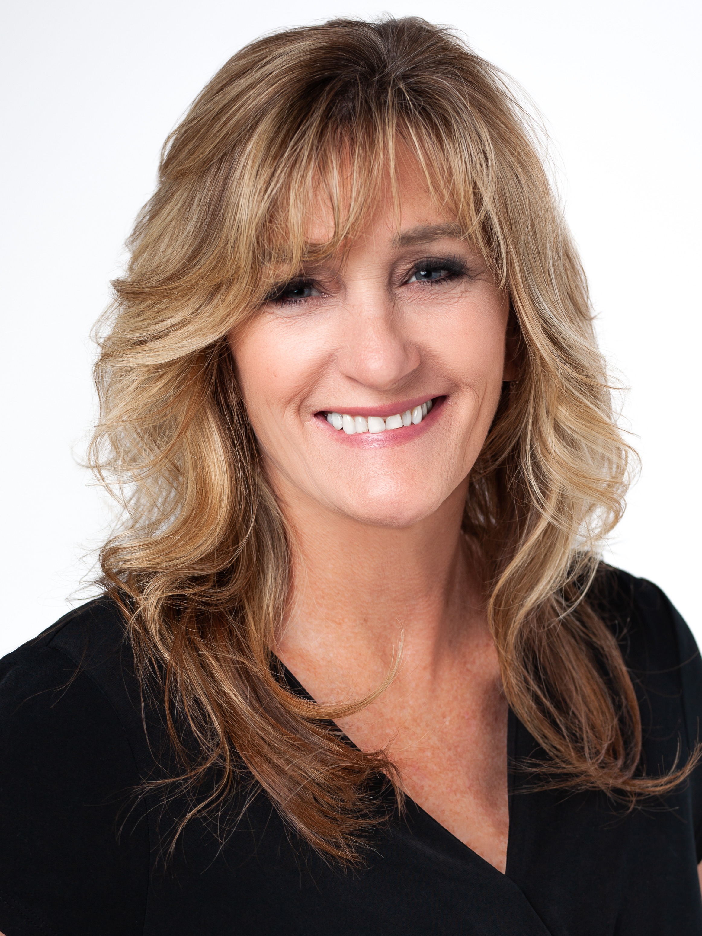 Headshot of Kelly