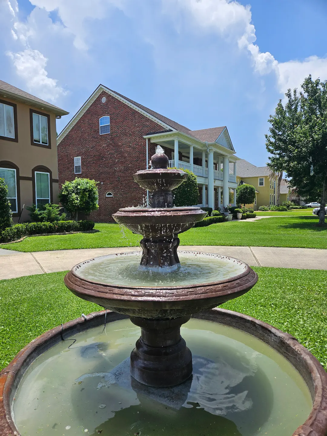 a fountain in a yard