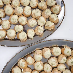 A couple of plates filled with food on top of a table.