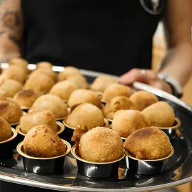 A tray of food that is sitting on a table.