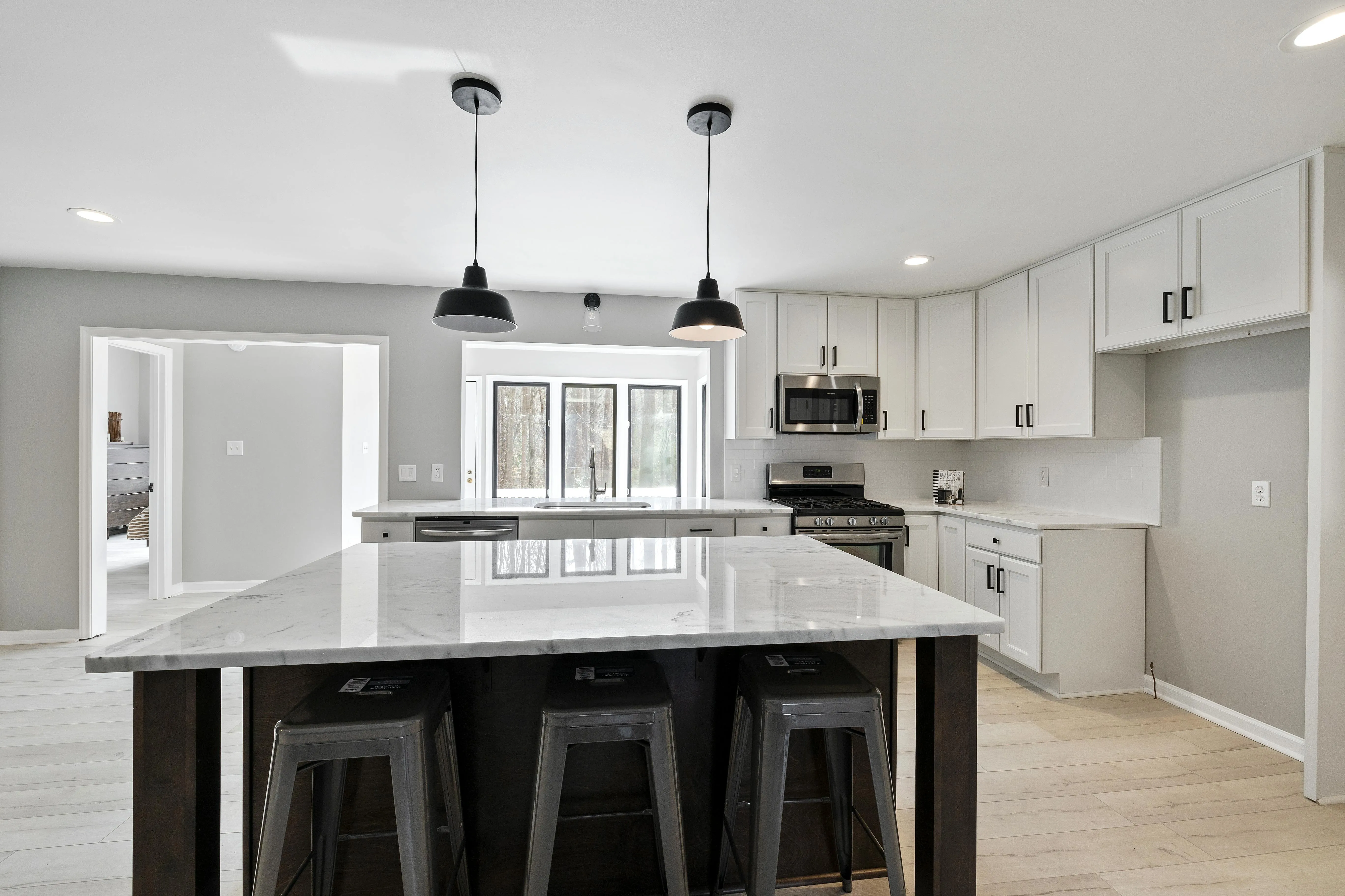 kitchen island with bar chairs