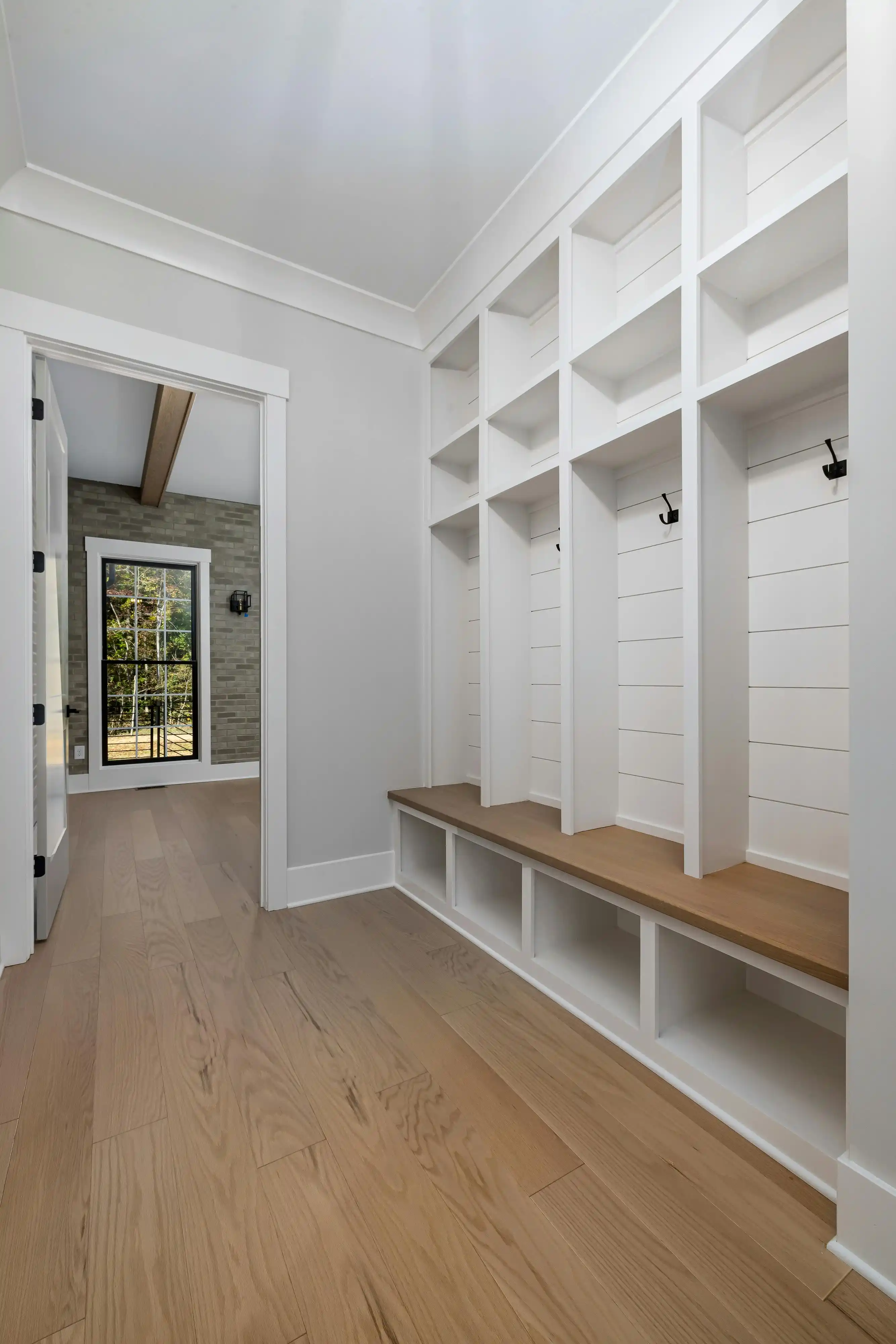 Mudroom entryway bench hooks storage