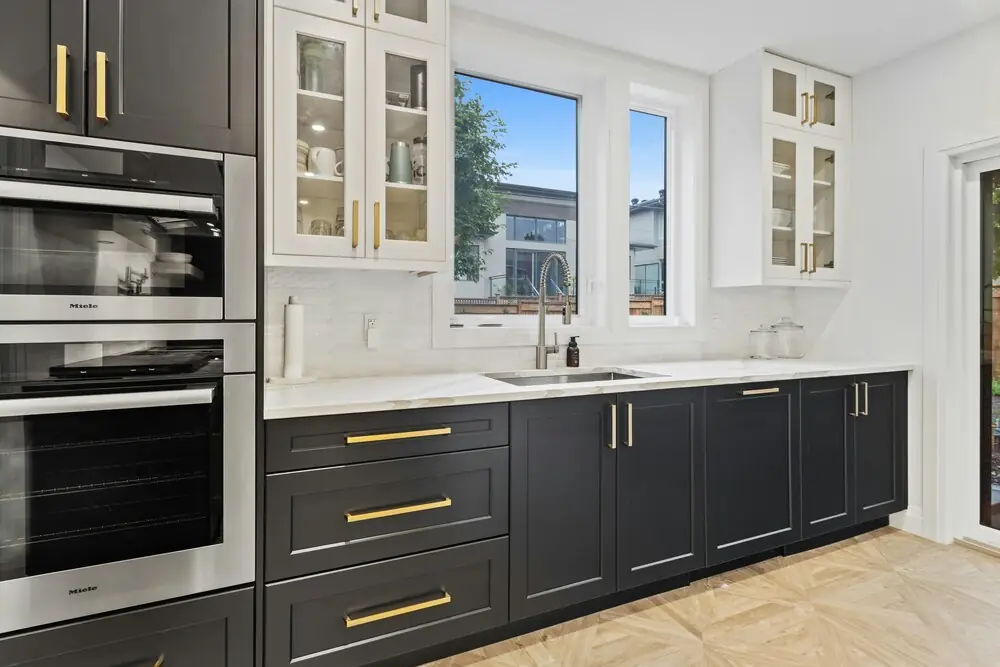 Two-tone kitchen cabinets dark lower light upper renovation Surrey White Rock BC