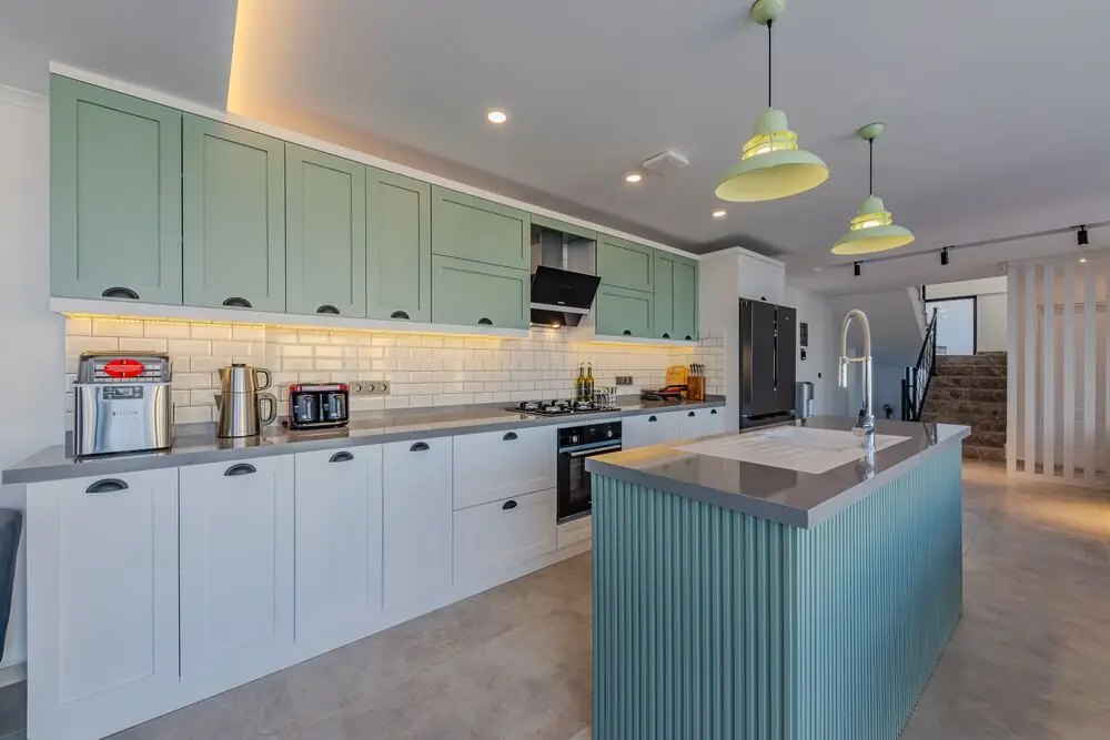 Muted green kitchen cabinet two-tone renovation Surrey White Rock Langley BC 2026