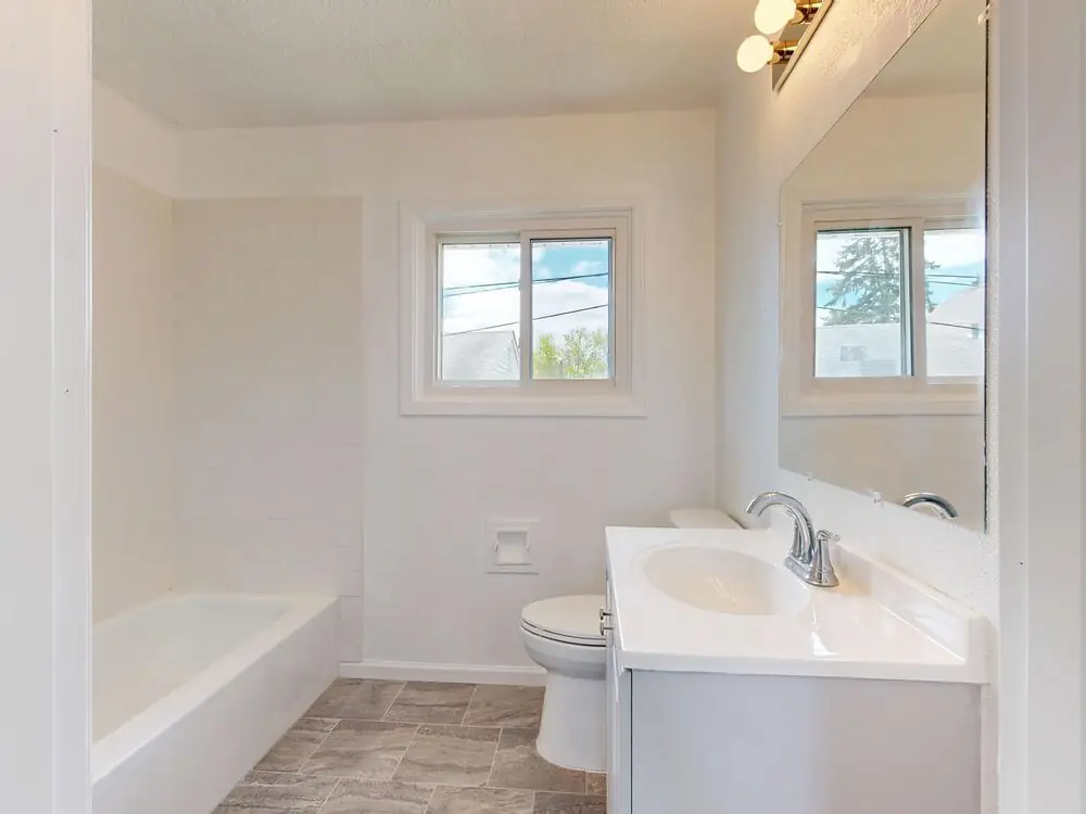 Sheet Vinyl bathroom floor modern warm renovation Surrey White Rock Langley BC