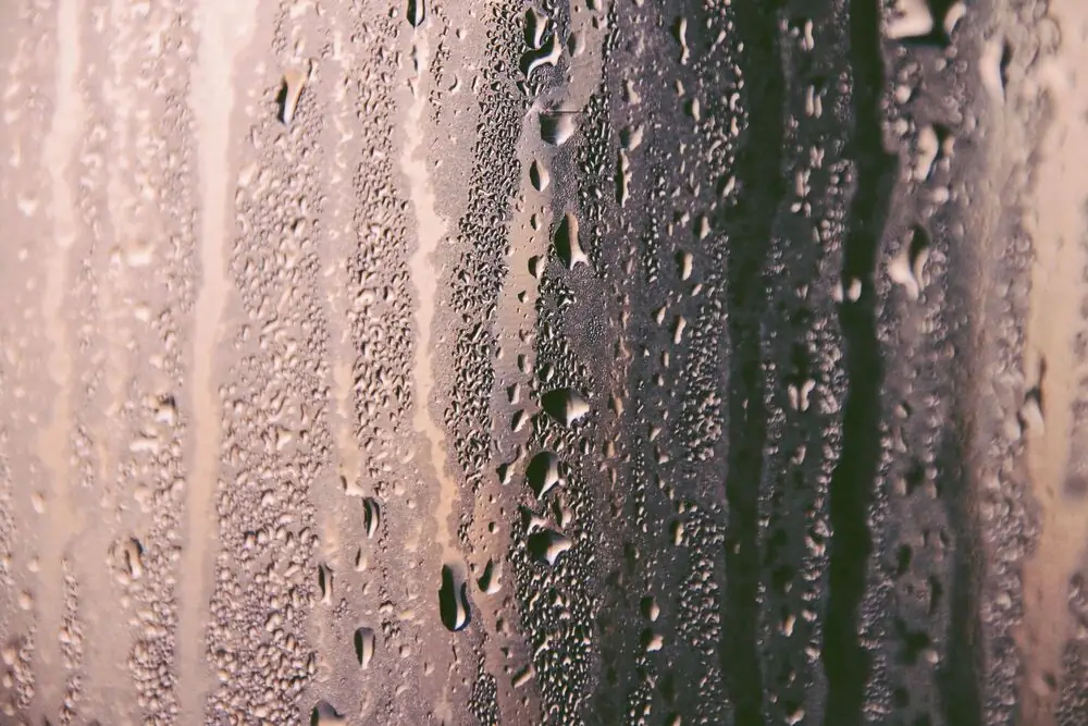 Condo window condensation winter concrete Surrey White Rock BC