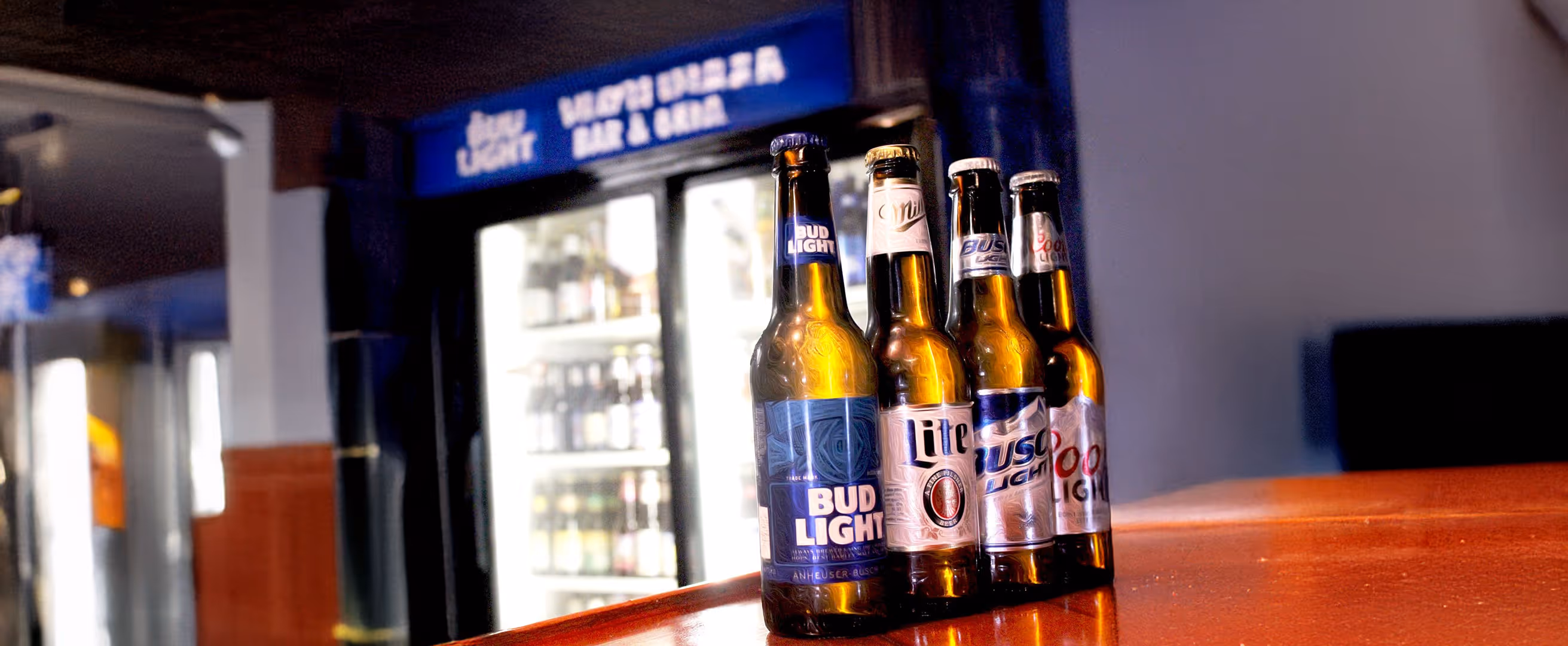 Four beers on a table.