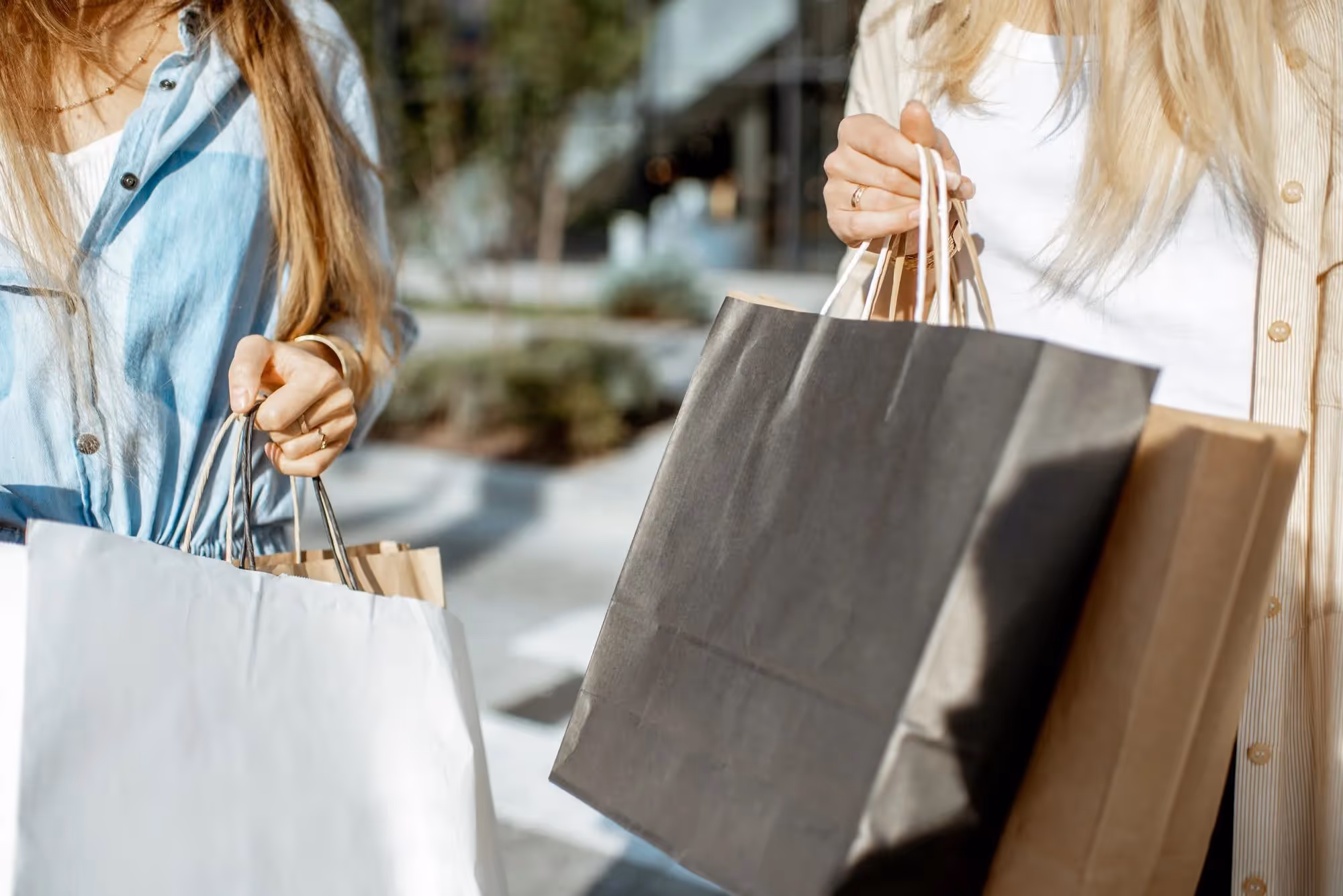 women with shopping bags stock image